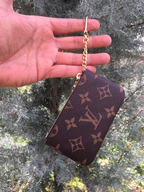 how to spot fake louis vuitton keychain wallet|louis vuitton keychain wallet dupe.